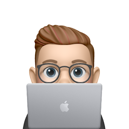 Person peeking from behing laptop